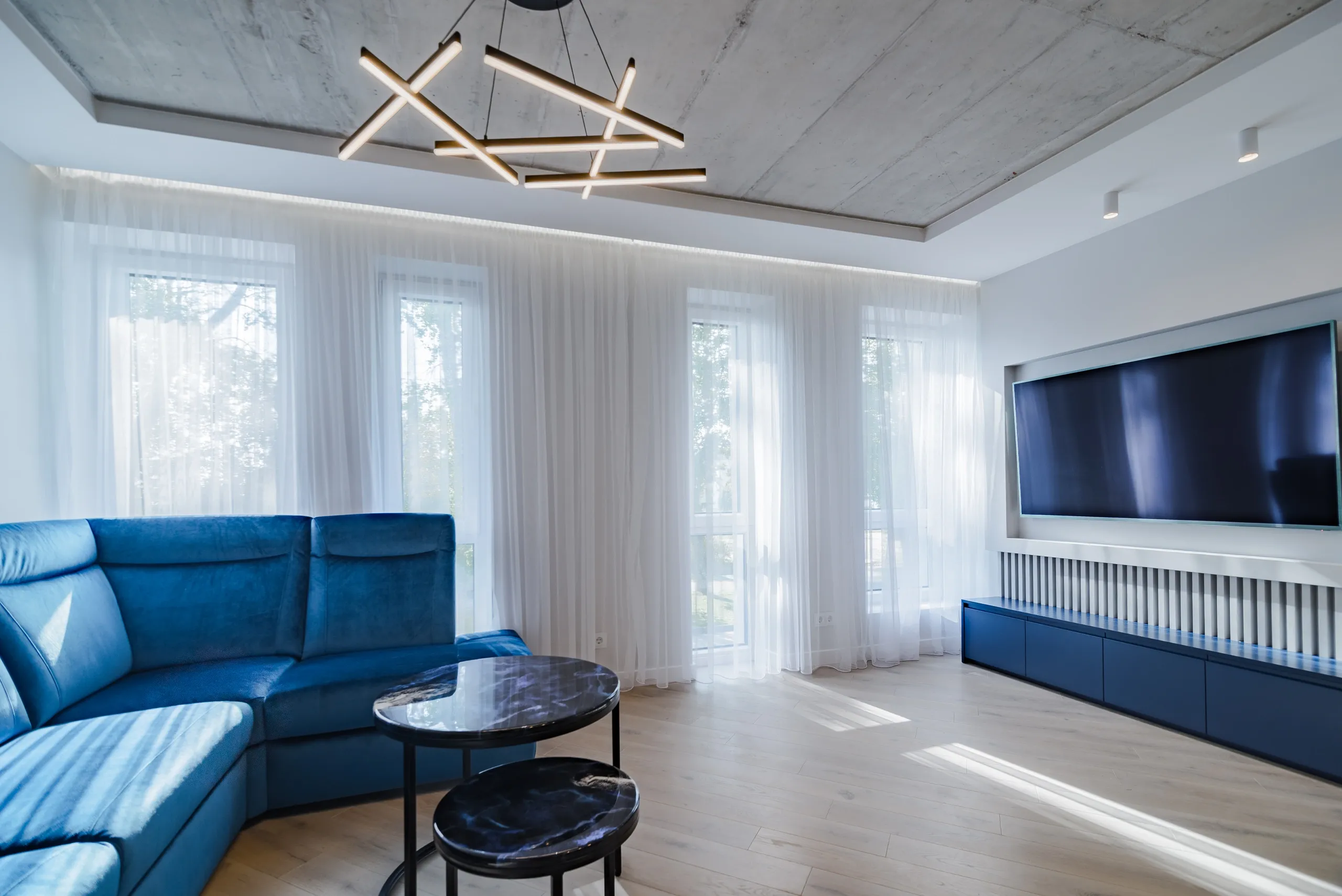 RightFit sheer curtains installed in a modern living room